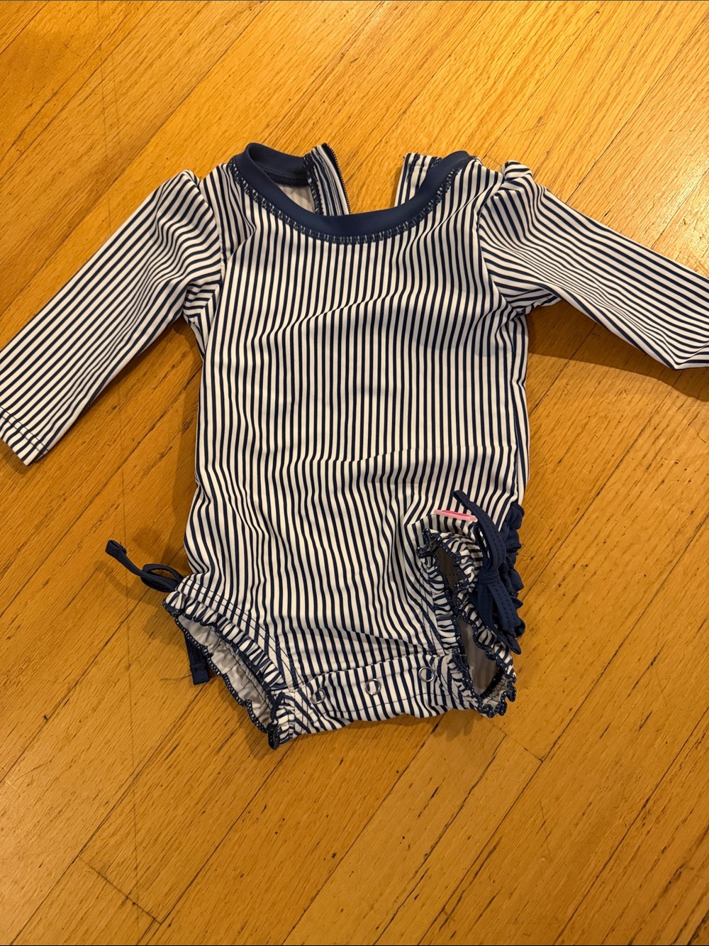 RuffleButts Navy & White Striped Long-Sleeve One-Piece Swimsuit